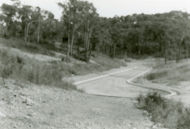 Photograph, 1979-80 MMBW pipe line project at Hubbard Reserve, North Ringwood. Debbie Place from the east end
