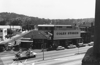 Photograph, Clocktower view towards Loughnan's Hill overlooking the telephone exchange in Ringwood Street, and the Post Office, Coles Store and State Savings Bank fronting Maroondah Highway, Ringwood - 1969