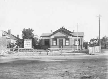 Photograph, Ringwood's Mechanic's Institute, Dec 1924, fenced prior to construction of the town hall fa�ade