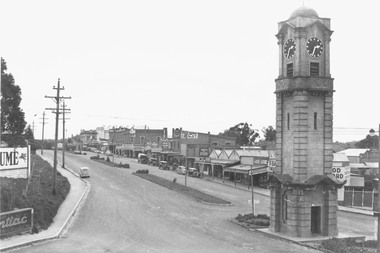 Photograph, Maroondah Highway Central, Ringwood. Clocktower and Main Street, c1930.Postcard view of the clocktower and main street from the railway bridge above Warrandyte Road and Maroondah Highway, Ringwood - c.1930