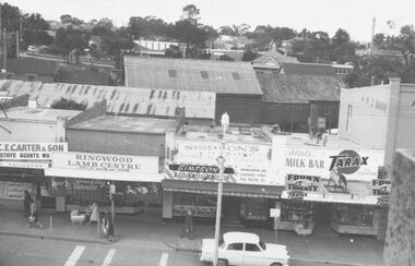 Photograph, Maroondah Highway Central, Ringwood. Shops opposite Town Hall, 1962