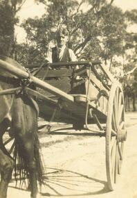 Photograph, Mr. Leo Pratt.  Driving down Nelsons Hill, 1927