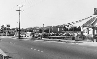 Photograph, Maroondah Highway West, Ringwood- 1969. House and business including BP Service Station, Smiths of Ringwood Volkswagen dealer