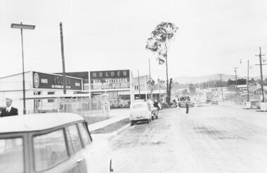 Photograph, Maroondah Highway roadworks outside Bill Patterson Motors. ca 1958?