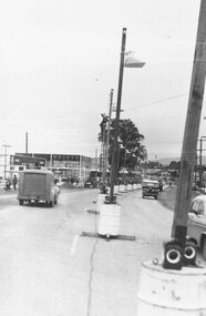 Photograph, Maroondah Highway West, Ringwood- c1958. Roadworks outside Bill Paterson Motors