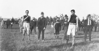 Photograph, Footballers at Mount Dandenong Road Recreation Ground oval circa 1914