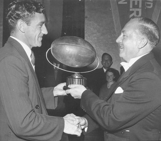 Photograph, Ringwood Football Club - Mr. Wright (Pres.), E.D.F.L. presenting trophy