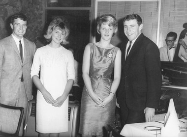 Photograph, Melbourne footballers Townsend and Bourke entertaining at 'Bird and Bottle' Croydon. c1970