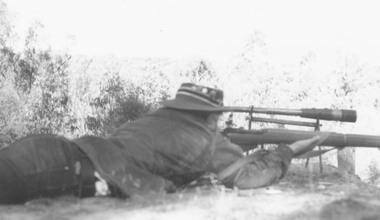 Photograph, Ringwood Rifle Club.  Yvonne Kay shooting, a left hander, coached by her father, Greg  (Two photographs) Possibly 1959