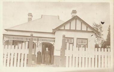 Photograph, Mr. and Mrs. Carr on verandah of house. (Undated)