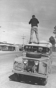 Photograph, Taking photos for historical records corner Oban Rd. and Warrandyte Rd. 1973.  Brian Pump on top, photo by R. Pullin"
