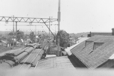Photograph, Ringwood railway station precinct.  View from pedestrian overpass looking west towards Melbourne c.1948