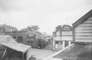 Photograph, Former Ringwood Mail office, Adelaide Street, 1955 looking along laneway to west showing Ham's Billiard Saloon to left, 1955