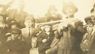 Photograph, Mrs. Wedge cutting ribbon at opening of East Ringwood railway station. Mr. Everard, MLA on left. 16 May 1925