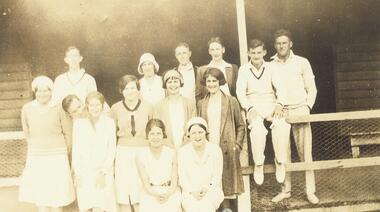 Photograph, Ringwood Tennis Club (undated).  Left Back Row - W. Dwight, Enid Connelly, Les Blood, Lance Lane, R. Skerritt, K. Storey.  Standing - Vicki Cooper, Alex Kerford, Rose Storey, Nell Hargraves, Miss ? Bamford, Mrs. J. Jamieson. Sitting - Miss J. Payne and Miss Edith Blood