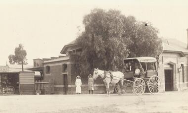 Photograph, Ringwood Station entrance - Ringwood to Warrandyte coach 1920