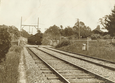 Photograph, First electric train going towards Ringwood passing through Heatherdale Rd. railway crossing. c.1923