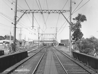 Photograph, Ringwood Railway Station, 1974, viewed from bridge over Warrandyte Road in foreground, looking west