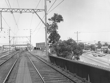 Photograph, Ringwood Railway Station overlooking Maroondah Hwy viewed from bridge over Warrandyte Road in foreground, 1974