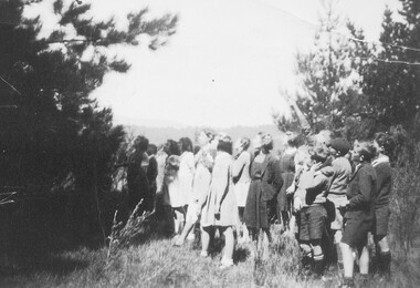 Photograph, Ringwood State School nature excursion to Corbett's Paddock (later site of Ford Street) 1940.  Daisy Paddock, teacher