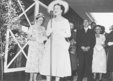 Photograph, Official opening of Greenwood Park Kindergarten, Greenwood Avenue, Ringwood on 10th December 1955. Speeches at official opening - Mrs. Helen Austin, Lady Violet Brooks, with Mrs. B. Hubbard, Mayoress, Cr. Ben Hubbard, Mayor, Mr. Roy Wilkins and Dr. B. Meredith looking on