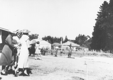 Photograph, Official opening of Greenwood Park Kindergarten, Greenwood Avenue, Ringwood on 10th December 1955. Lady Brooks being escorted to her car by Mrs. E.V. Pullin and Mrs. Jess Anderson