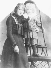 Photograph, Marie Herry (b. 1884) and Louis, eldest daughter and youngest son of Louis and Kate Herry - circa 1900.  Marie's father, Louis Herry, was born in Purdu, France in 1855. He married Kate Handforth at Walhalla, Vic. in 1879 and came to Ringwood in 1887 where he erected a weatherboard house and bakery opposite the Club Hotel, using a Miner's Right to secure the land. (Source: Ringwood, Place of Many Eagles - Hugh Anderson)