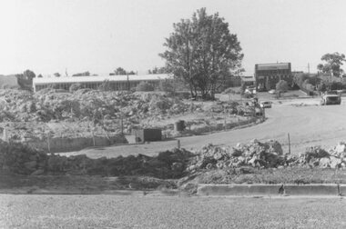 Photograph, Road and carpark construction works for Ringwood Market and Target Square shopping centres, viewed towards Charter and Seymour Streets from Bond Street, Ringwood - 1984