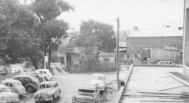 Photograph, Harry Tortice's wood yard and old lane now Civic Place, Ringwood.  Undated