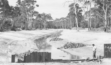 Photograph, New bridge over Dandenong Creek Wantirna Road Ringwood, being built and creek lined, 1970