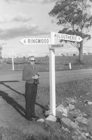 Photograph, Hampshire, England.  Road sign indicating distance to Ringwood. Undated