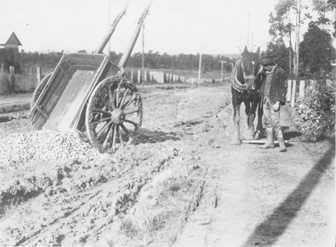 Photograph, Wantirna Rd, Ringwood - early view of unmade road with horse and cart (undated)