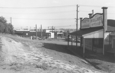 Photograph, Old Level Crossing, Ringwood, looking North with Webdales Licensed Grocers. Mid 1976