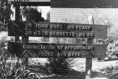 Photograph, Sign listing doctors at consulting rooms at north-east corner of Warrandyte and Oban Roads, North Ringwood. 1981