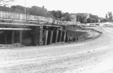 Photograph, Old Warrandyte Rd bridge. and unsurfaced bypass road. Ringwood. Probably 1986  (2 views)
