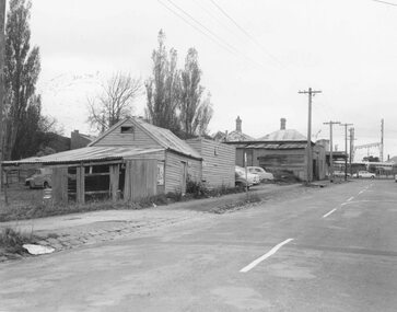 Photograph, Maroondah Highway Central, Ringwood. Buildings at rear of property, N.E. corner of Adelaide Street and Maroondah Highway, 1963. (Eastland Litigation Photo), May 1963