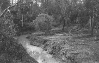 Photograph, Mullum Creek looking east from bridge in Warrandyte Road Ringwood.  St. Paul's extreme left, 1972