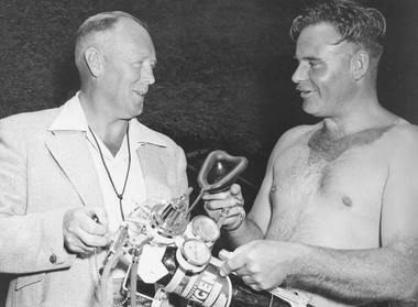 Photograph, Ringwood Swimming Club- First Constable Bill Hall receiving an oxygen respirator on behalf of the Club- 1957
