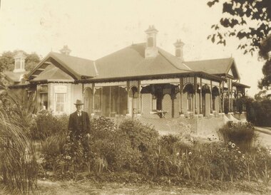 Photograph, Captain Miles and his home. 1920