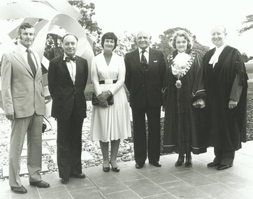 Photograph, Official opening of the Karralyka Centre, Mines Road, Ringwood on 19/4/1980 - L-R: A.C. Robertson (City Engineer), Harry Seidler (Architect), Lady Winneke - Ellis Fauld (uncertain), Victorian Governor Sir Henry Winneke, Cr Pat Gotlib (Mayor), Arthur W Hall (Town Clerk), 19-Apr-80