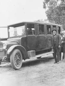 Photograph, William Hussey and William John Hussey with the first bus on the Ringwood - Warrandyte run.1926, incl Timetable