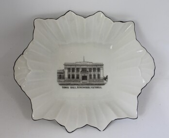 Souvenir - Small bowl, R K G, White china bowl, irregular shape with black edge around flutes with pen and ink drawing of the Ringwood Town Hall