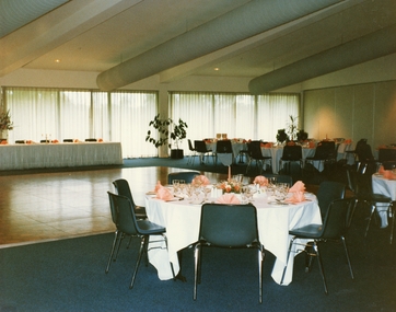 Photograph, Coloured photo of the Karralyka theatre convention centre set up with round tables ready for a reception