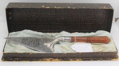 Ceremonial object - Trowel in Box, Apex, Wooden handles silver trowel in presentation box presented to Cr J K McCaskill by J C Taylor & Sons Pty Ltd. to lay the Foundation Stone of the Ringwood Town Hall 27.6.1936, 1936