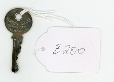 Key in presentation box, Silver key to the original clock tower on the occasion of opening on 4-Aug-1928 in a blue velvet presentation box, lying on a cream silk lining. Presented to Mayor of Ringwood W Mackinlay, 1928