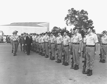 Photograph, Official opening of the Karralyka Centre, Mines Road, Ringwood on 19/4/1980 - Sir Henry Winneke inspecting the honour guard, 19-Apr-80