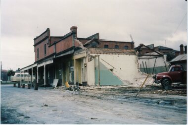 4 Coloured photographs numbered 10043 to 10046, Demolition of buildings in Adelaide Street -Ringwood. Circa 1960