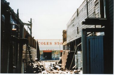 Photograph, View of Coles Store - Ringwood - looking through Coolstores demolition - circa 1960's