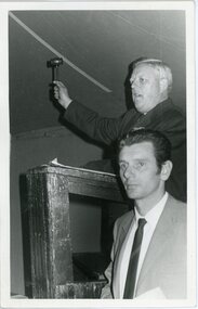 Photograph, A B Carter conducting land sales auction at Ringwood East. Circa 1970