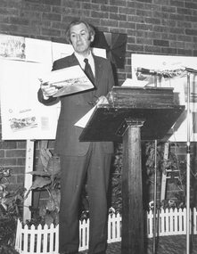 Photograph, Mr Ken Horn, Latrobe librarian,launching History of Ringwood book at Civic Centre. 1974